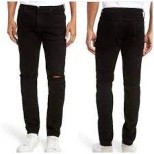 FRAME - L'Homme Skinny Jean in  Noir Slits